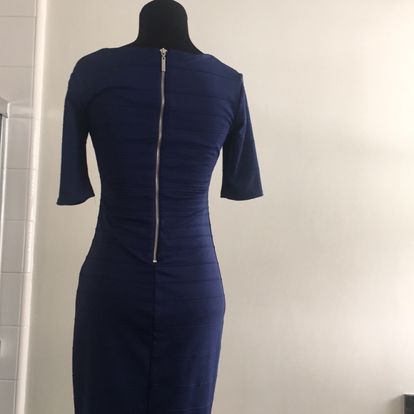All blue with a long zipper in the back 💙🤤 - Picture 2 of 2